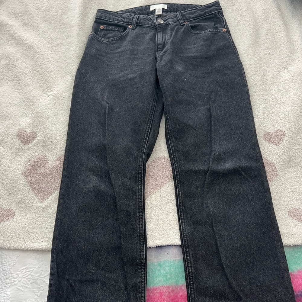 H&M low waisted black jeans.